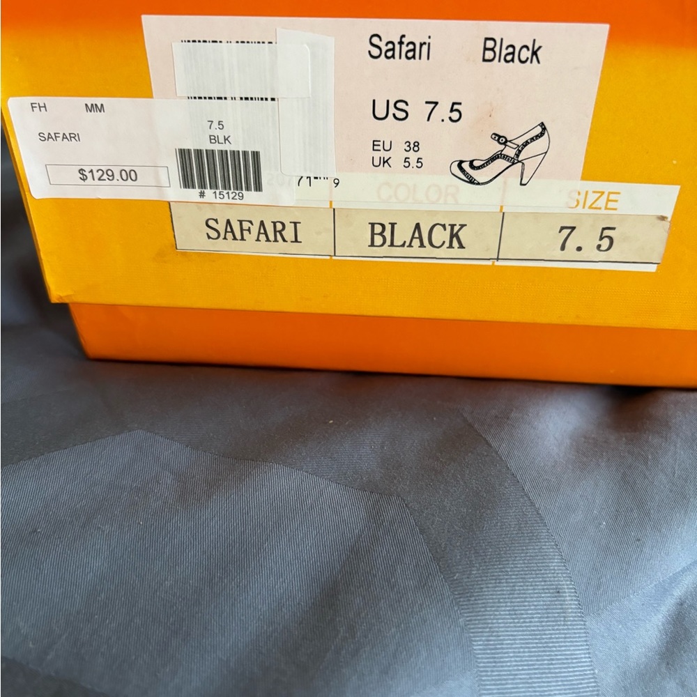 Miz Mooz size 7.5 black and beige spectators.